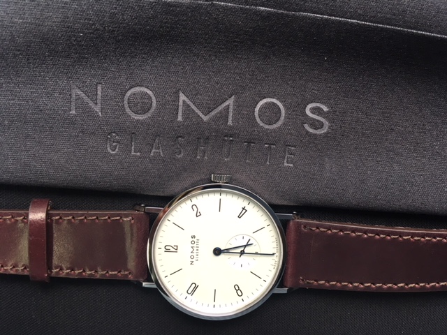 nomos-tangente